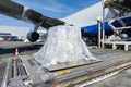 Loading of cargo to the  aircraft Royalty Free Stock Photo