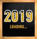 2019 loading, chalk drawing on black board Royalty Free Stock Photo