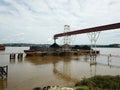 Loading coal onto the barge from the stock pile, aerial view