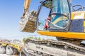 Loading excavator on semi trailer