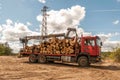 Loading of felled timber in a truck with crane Royalty Free Stock Photo