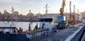 Loading grain in the port. Evening panoramic view of the port Royalty Free Stock Photo