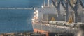 Loading grain to the ship in the port. Panoramic view of the ship Royalty Free Stock Photo