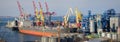 Loading grain to the ship in the port. Panoramic view Royalty Free Stock Photo