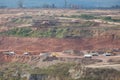 Loading of iron ore on very big dump body truck Royalty Free Stock Photo