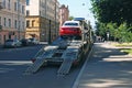 Loading of new cars onto a road train Royalty Free Stock Photo