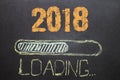 Loading New Year 2018 on Blackboard Royalty Free Stock Photo