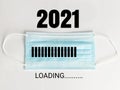 2021 loading progress with disposal face mask.