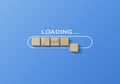 Loading, reboot, refresh or mindset concept. Wooden blocks are arranged in progress bar on blue background with the word uploading Royalty Free Stock Photo