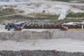 Loading of sand by excavators into railway cars