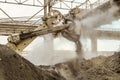 Loading of with a heavy bucket excavator. Heavy industry.