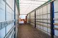 Stack of Freight Containers at the Docks with Truck Royalty Free Stock Photo