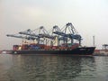 Loading and Unloading Container at Tanjung Priok Port Royalty Free Stock Photo