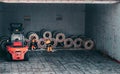 Loading and unloading process of steel coils in cargo port. Carry steel coils. View on procces into cargo hold. Copy space. Backgr Royalty Free Stock Photo