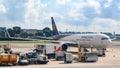 Loading of UPS - United Parcel Service - Boeing 767 Worldwide Services at Singapore Airport. International cargo.