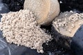 Loading zeolite for mechanical water purification and a sponge for keeping the filling in the filter Royalty Free Stock Photo