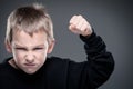 Loads of aggression in a little boy Royalty Free Stock Photo