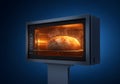 Freshly baked bread in a modern oven with warm interior lighting Royalty Free Stock Photo