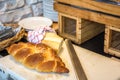 Loaf of Bread on Block with Knife Royalty Free Stock Photo