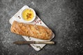 Loaf of bread with olive oil and spices Royalty Free Stock Photo