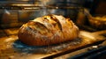 A loaf of bread is sitting on a baking tray Royalty Free Stock Photo
