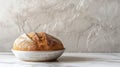 A loaf of bread in a white bowl on top of marble counter, AI Royalty Free Stock Photo