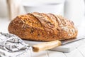 Loaf of bread on white table Royalty Free Stock Photo
