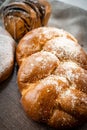 loaf of bread on wooden background, food closeup Royalty Free Stock Photo