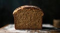 A loaf of brown bread, showcasing its texture and shape Royalty Free Stock Photo