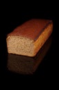 Loaf of dark rye bread isolated Royalty Free Stock Photo