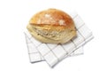 loaf of homemade bread on a towel isolated on white Royalty Free Stock Photo