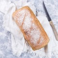 Loaf of homemade no knead sandwich bread with knife, top view, square Royalty Free Stock Photo