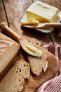 Loaf of rye bread with cut slices on a board Royalty Free Stock Photo