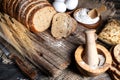 loaf of rye bread, ears of wheat, eggs and a bowl of flour. Close-up Royalty Free Stock Photo