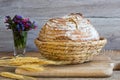 Sourdough bread in a basket on a table Royalty Free Stock Photo