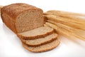 Loaf of wheat bread and shocks of wheat Royalty Free Stock Photo