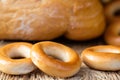 Loaf of white wheat bread, bagels and buns. Close up. Home baker Royalty Free Stock Photo