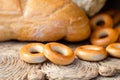 Loaf of white wheat bread, bagels and buns. Close up. Home baker Royalty Free Stock Photo