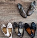 Loafers and other shoes retro style stand on the wooden floor