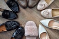 Loafers and other shoes retro style stand on the wooden floor