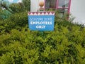 Loafing zone employees only sign and green plants Royalty Free Stock Photo