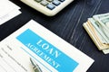 Loan Agreement form with cash and calculator Royalty Free Stock Photo