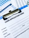 Loan application form document with graph on table Royalty Free Stock Photo