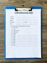 Loan application form document with graph on table Royalty Free Stock Photo