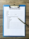 Loan application form document with graph on table Royalty Free Stock Photo