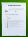 Loan application form document with graph on table Royalty Free Stock Photo
