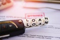 Loan approval / financial loan application form for lender and borrower for car with key and calculator