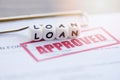 Loan approval / financial loan application form for lender and borrower for help investment bank estate Royalty Free Stock Photo