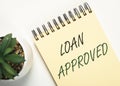 Loan approved inscription on paper. Financial borrowing and lending concept Royalty Free Stock Photo