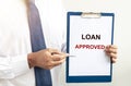 Loan approved inscription on paper. Financial borrowing and lending concept Royalty Free Stock Photo